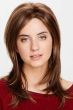 Woman in a past the shoulders long layered medium brown wig