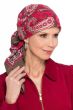 Woman in red hand stamped pre tied head scarf for cancer patients