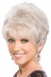 Woman in a petite teased long light grey pixie wig with side bangs