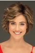 Woman in a chin length light brown curly layered lace front bob wig