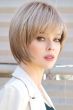 Woman in blonde, short, straight chin length bob wig with layers