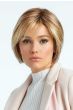 Woman in a chin length light auburn layered lace front rounded bob wig with side bangs