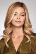 Woman in a 12" strawberry blonde curly hair topper for thinning hair