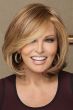 Raquel welch in a straight shoulder length light auburn rounded bob wig with long side bangs