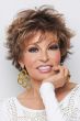 Raquel Welch in a tousled medium auburn pixie wig with fringe bangs