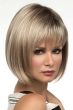 Woman in a chin length light blonde blunt bob wig with textured bangs
