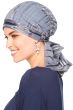Woman in blue tie dye pre tied head scarf for women with cancer