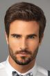 Man in a styled dark brown evenly layered lace front wig