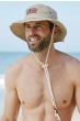 Cool man in navy distressed baseball cap with american flag patch on the front