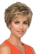 Woman in a long light brown lace front pixie wig with side bangs
