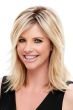 Woman in a light blonde 8" to 10" layered wiglet hair topper