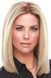 Woman in a 12" light blonde human hair topper for thinning hair