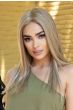 Woman in an extra long medium brown blunt cut lace front wig