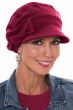 Woman in soft grey heather newsboy cap with detachable bow on the side for women with cancer