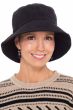 Woman in black corduroy winter bucket hat for cancer patients