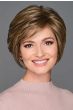 Woman wearing short layered bob wig with side-swept bangs and highlighted brown tones, soft volume and natural shape