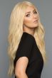 Woman in a petite extra long wavy light blonde lace front human hair wig