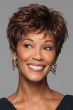 Afro American woman in medium brown pixie wig with tapered back and longer hair on top