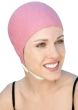 Woman in pink molded rubber swim cap with textured leaves and chin strap