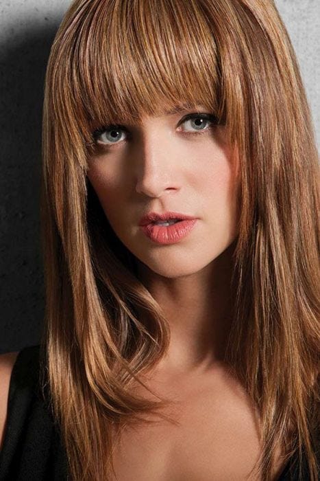woman in blunt medium auburn fringe clip in bangs