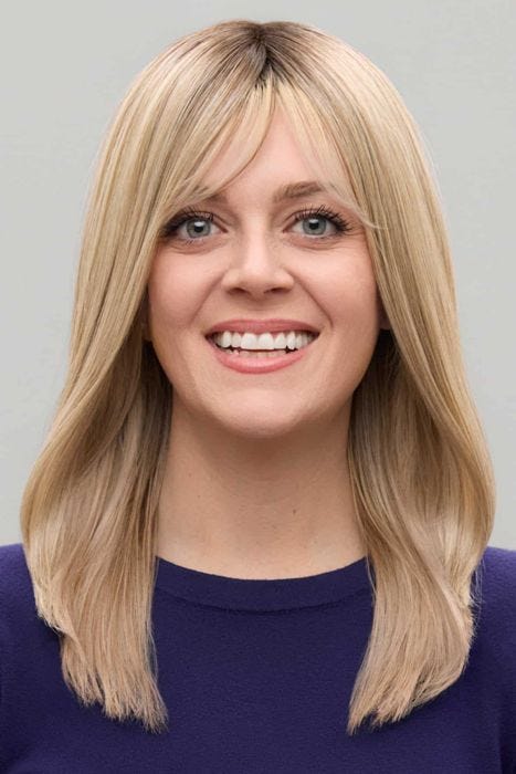 Woman in a 12" blonde hair topper for thinning hair