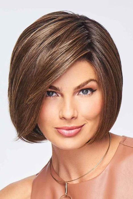 Woman in a chin length medium brown lace front blunt bob wig