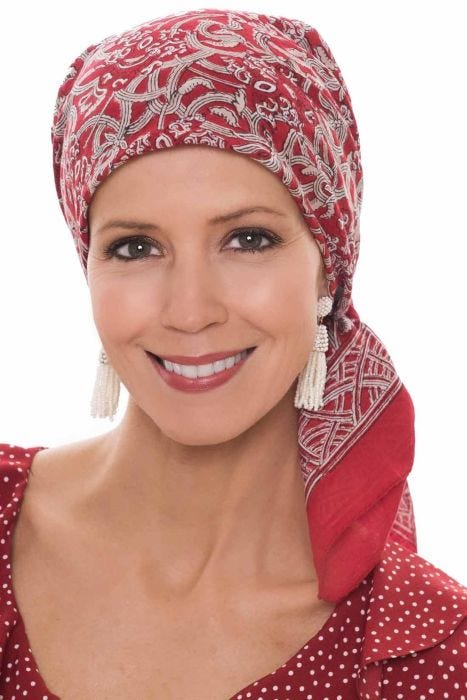 Woman in red printed hand stamped head scarf for women