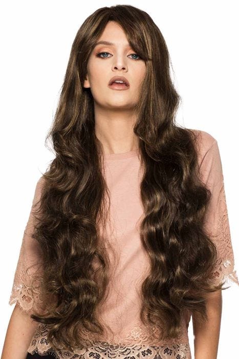Woman in a large 32" wavy dark brown full wig