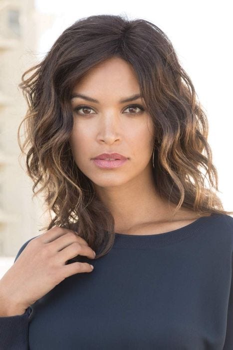 Woman in an 11.5" wavy light brown hair topper for thinning hair