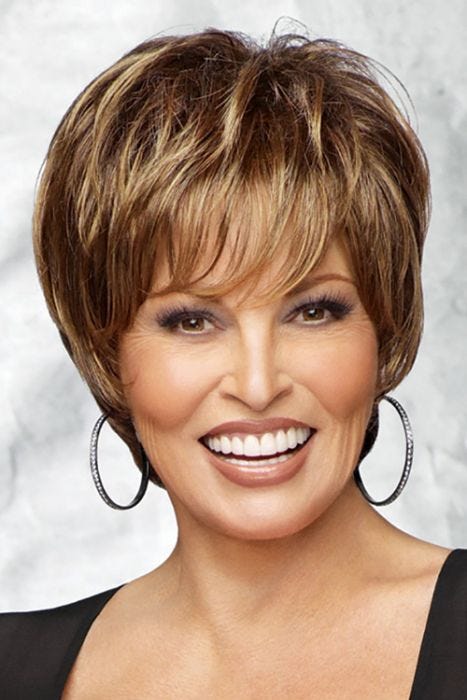 Raquel Welch in short brown highlighted wig with long layers