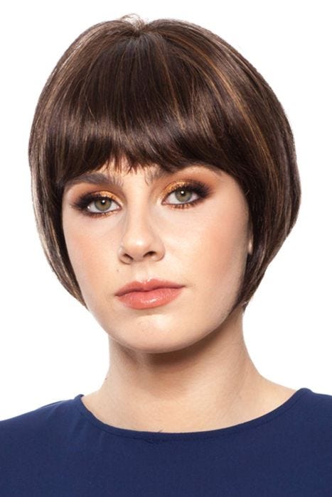 Woman in a chin length medium brown rounded bob wig with blunt bangs