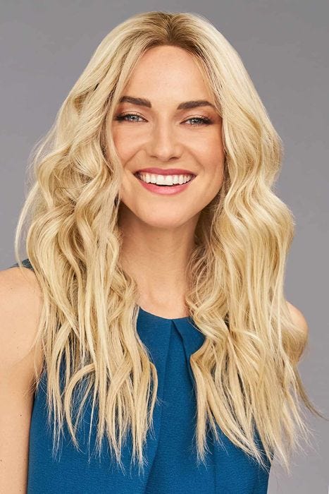 Woman in an extra long dark auburn remy human hair wig