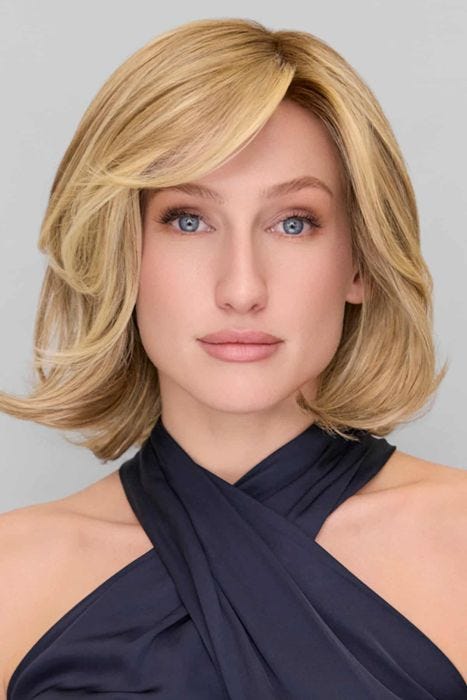 Woman in a short, blonde wavy lace front bob wig with side swept bangs