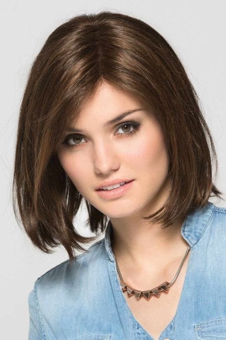 Woman in a shoulder length dark brown blunt lace front wig