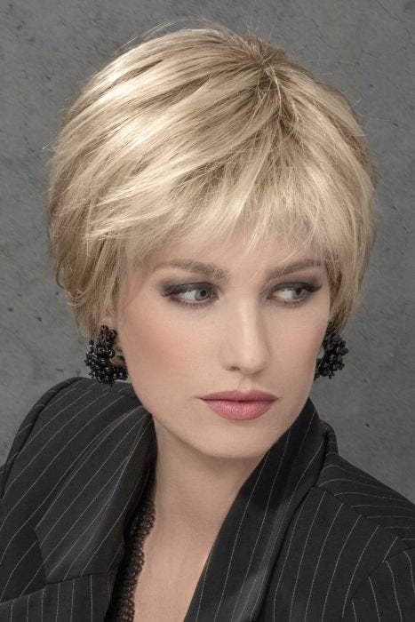 Woman in a long blonde pixie lace front human hair topper