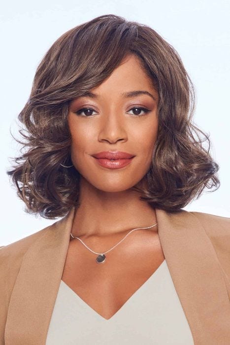 A shoulder-length wavy bob wig with side-swept face framing layers and soft, defined curls