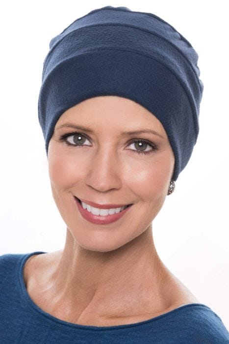 Woman in blue fleece turban for cancer patients