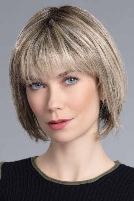 Woman in a 5.5" to 9.75" light brown hair topper for thinning hair