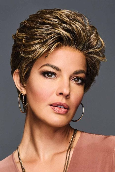 Woman in a light brown lace front pixie wig with choppy layers