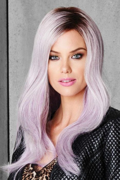 Woman in an extra long wavy lilac wig with dark roots