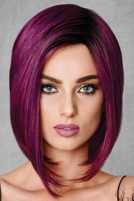 Woman in an shoulder length deep purple angled bob wig with dark roots
