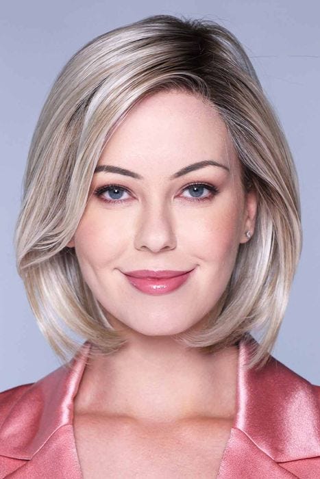 Woman in a past the chin light blonde lace front bob wig