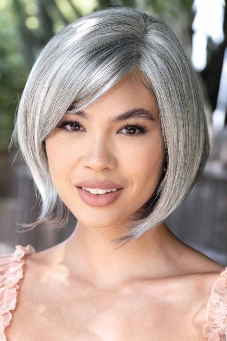 Woman ina past the chin salt and pepper angled lace front bob wig