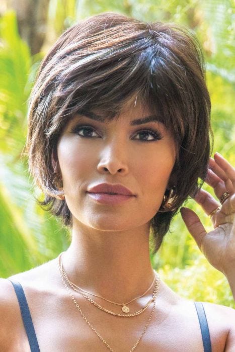 Woman in brown short, straight layered wig with bangs