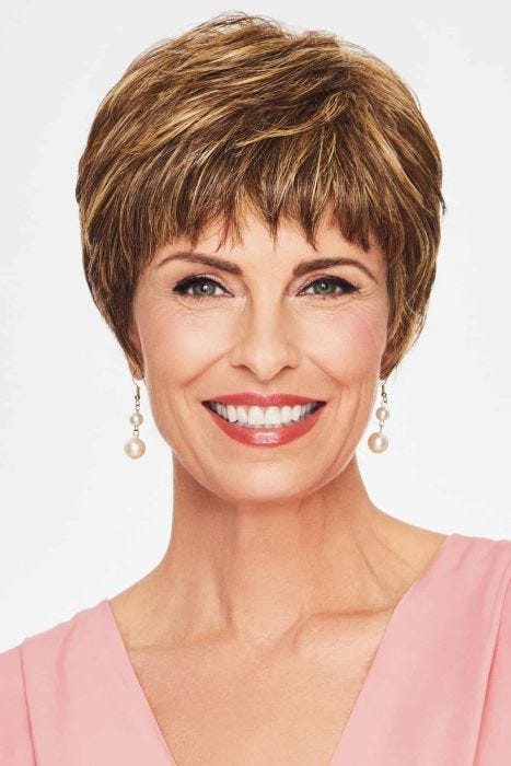 A textured pixie cut wig with choppy layers and wispy bangs