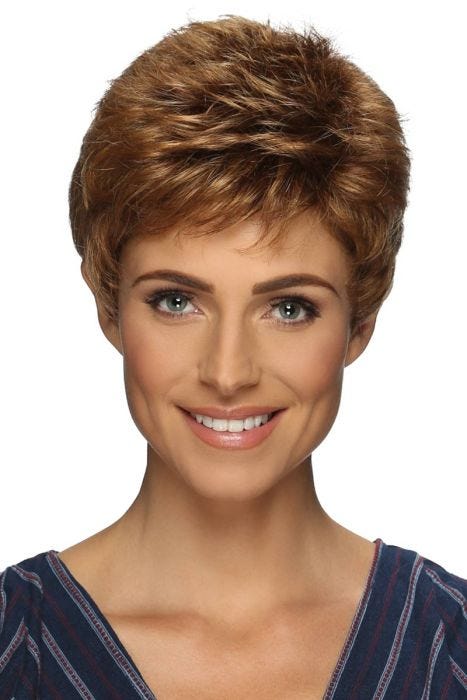 Woman in a petite classic light auburn pixie wig with fringe bangs