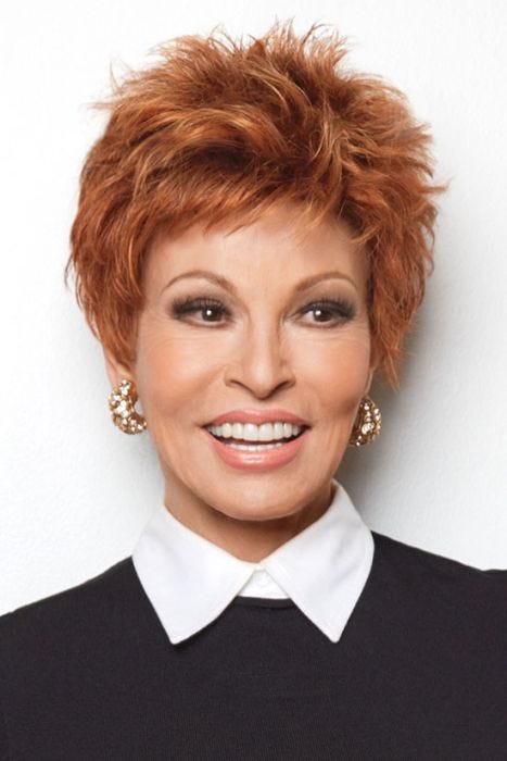 Raquel Welch in a medium red classic messy pixie wig