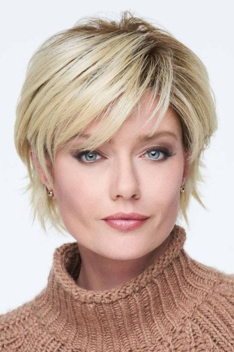 Woman in a short cropped light blonde lace front wig