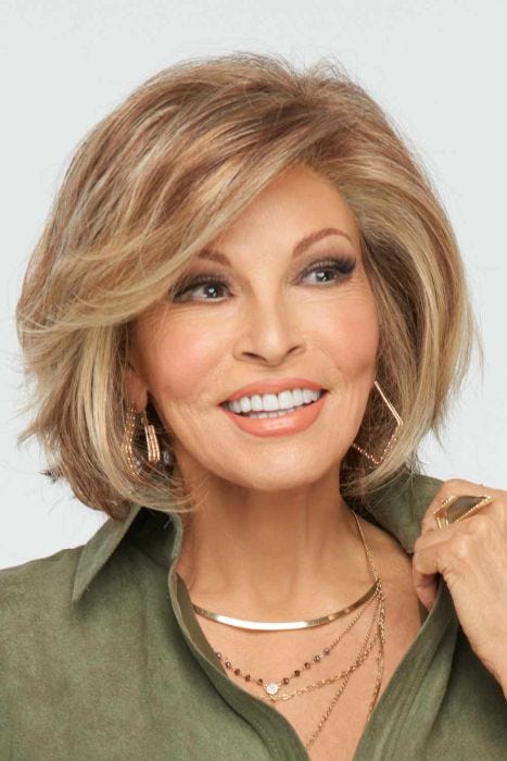 Raquel Welch in a past the chin light auburn lace front bob wig