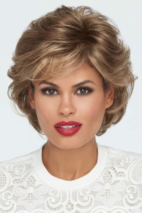Woman in a long light brown pixie wig